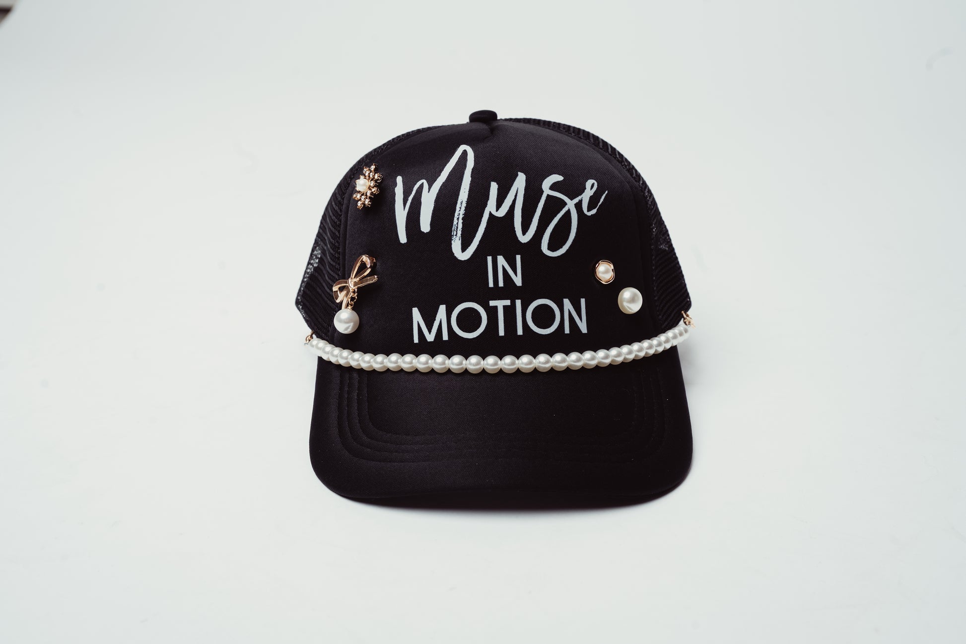 Muse in Motion Trucker Hat